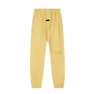 Fear of God Essentials Yellow Drawstring Sweatpants — seller product photo